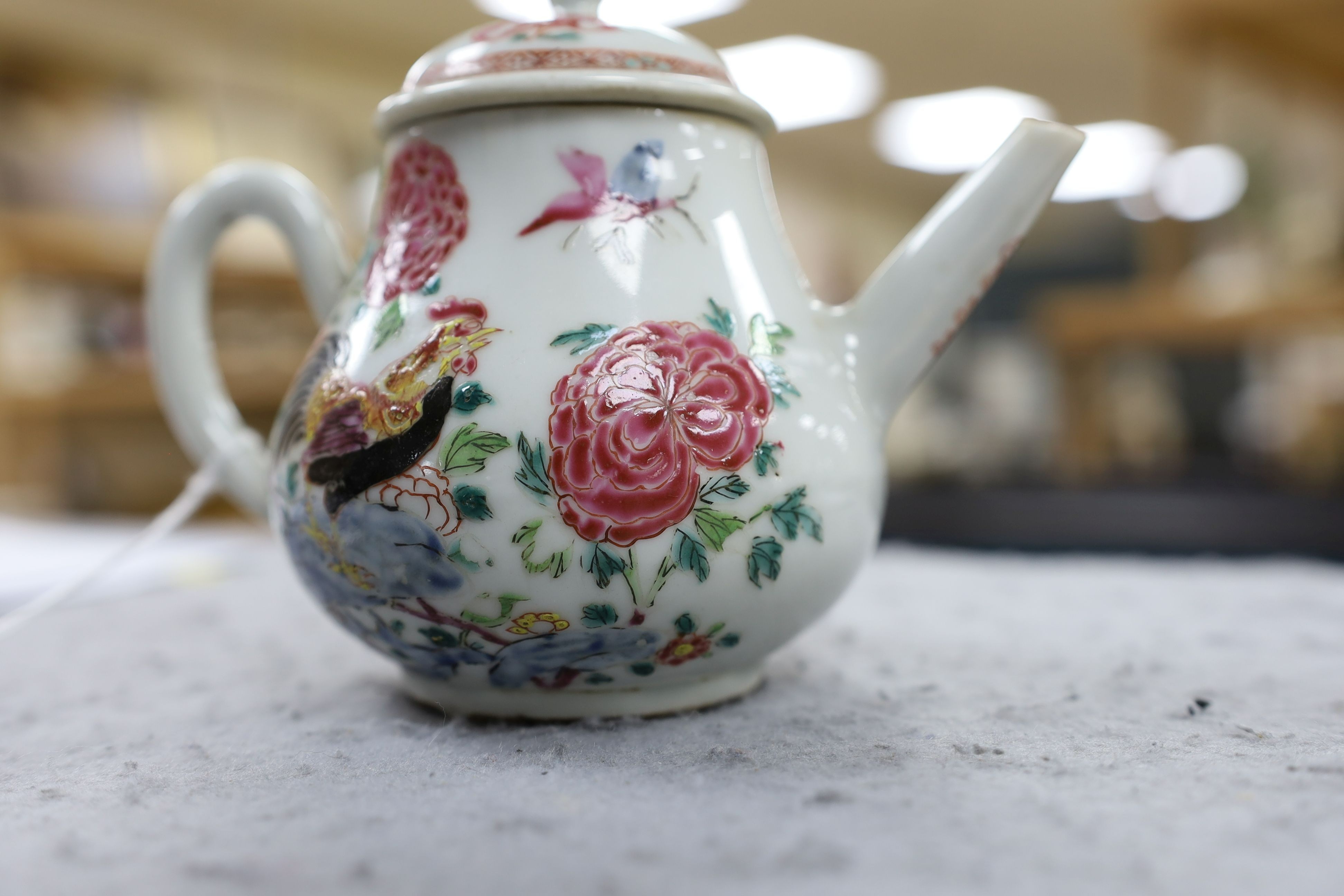A Chinese famille rose ‘cockerel’ teapot, Yongzheng period, 12 cms high, 11.5cm high